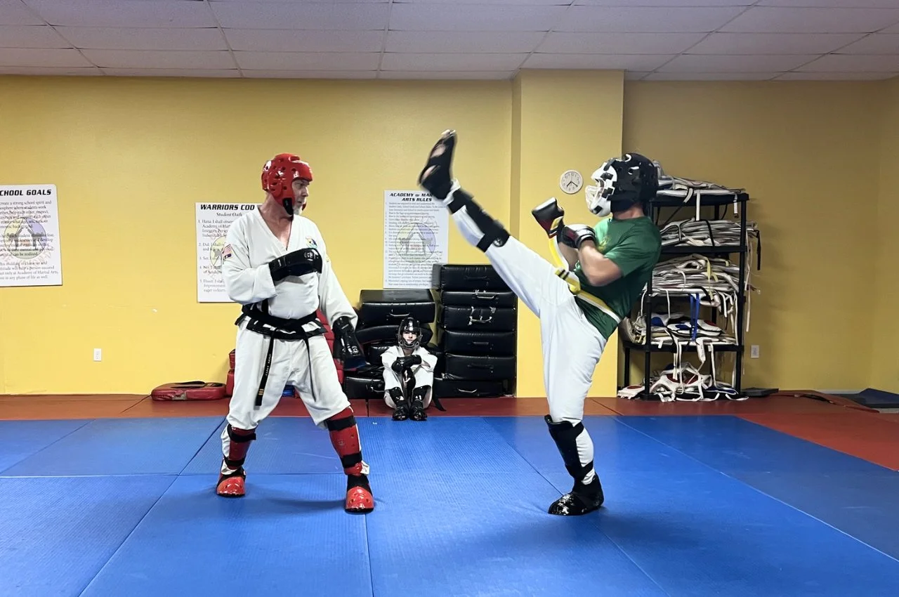 Adults building confidence through martial arts