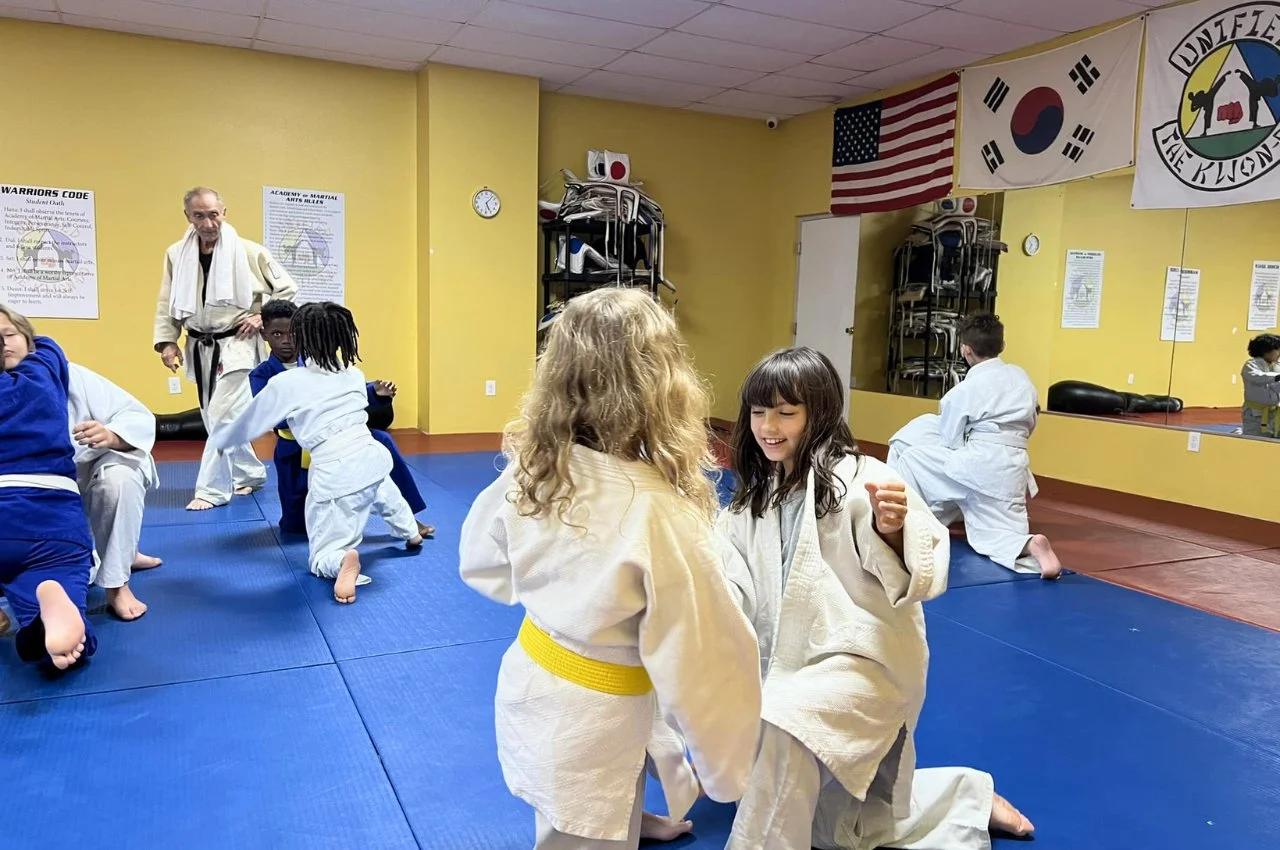 Child building confidence in martial arts